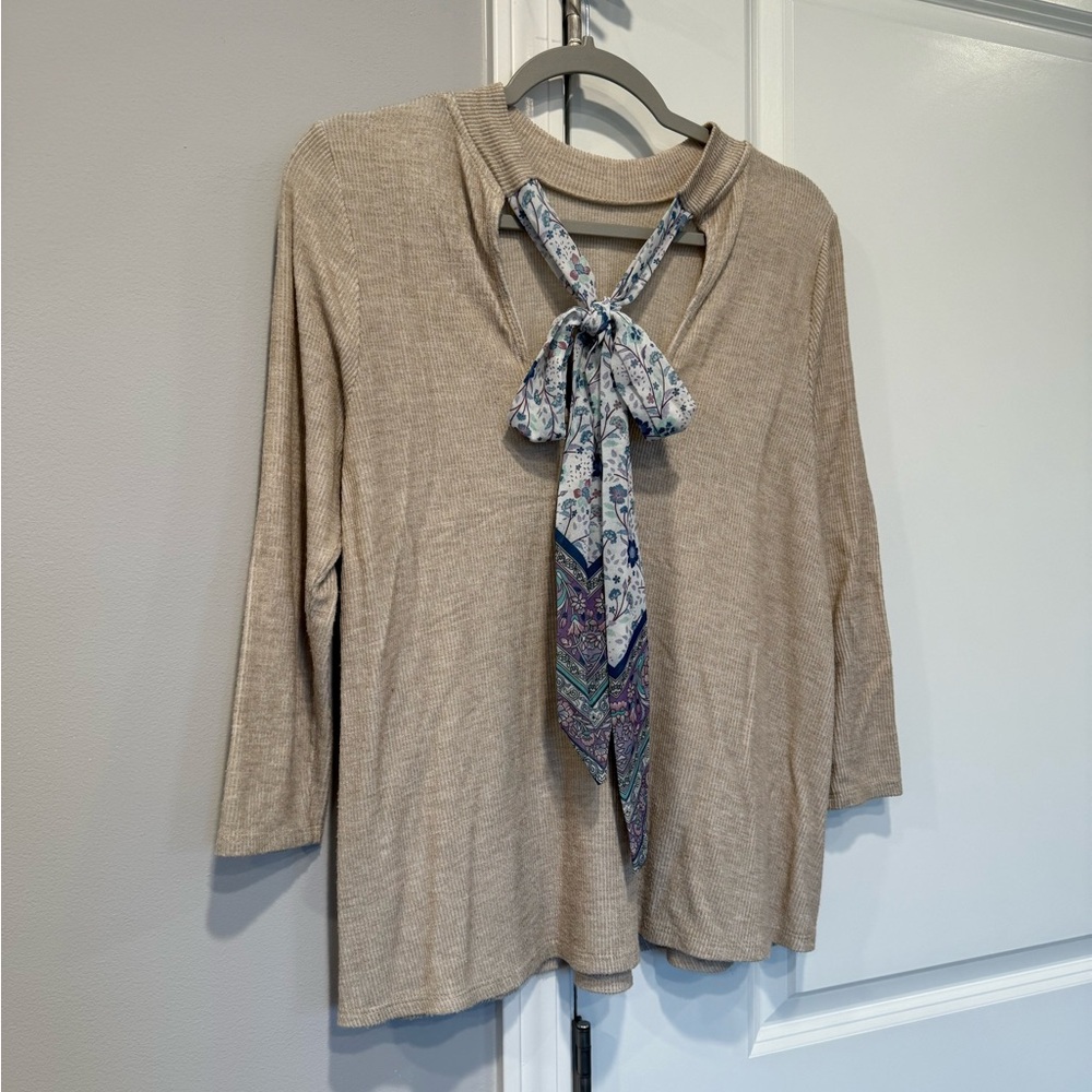Tan shirt with open back and bow